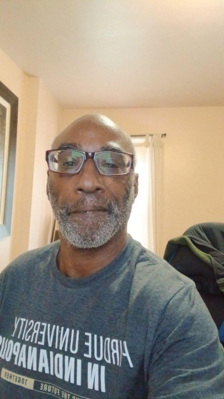 Emmett Lee White wearing a Purdue University t-shirt, casual selfie portrait